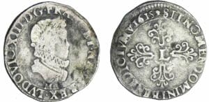Louis XIII - ½ franc au buste enfantin, tête laurée, col fraisé - 1615 M (Toulouse)