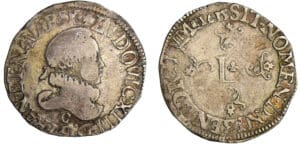 Louis XIII (1610-1643) - ½ franc au buste enfantin, tête laurée, col fraisé, au lis - 1615 C (Saint-Lô)