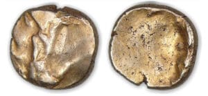 Flan monétaire celtique d'un statère d'or (IIIe-Ier Siècle av. J.-C.).