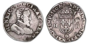 Henri II - Teston buste nu 1er type  1560 D (Lyon)