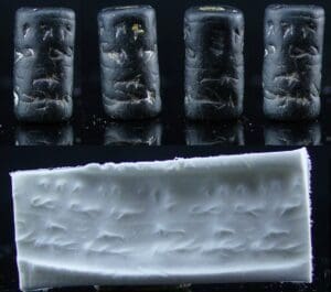 Mésopotamie - Sceau cylindre en pierre noire (scène à étages) - 3000 / 2000 av. J.-C.