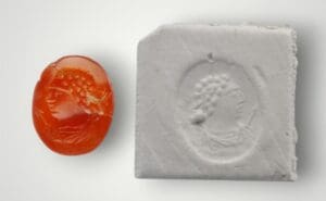 Romain, Empire d’orient - Italie - Intaille en cornaline (noble revêtant une toge) - 1er / 2ème siècle ap. J.C.