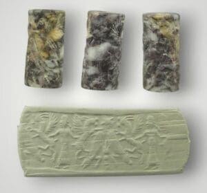 Mésopotamie, Néo-Babylonien - Sceau cylindre en pierre noire - Début 1er mill av. J.C.