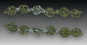 Celte - Chapelet de 6 rouelles en plomb à 4 rayons (Ier siècle av.)